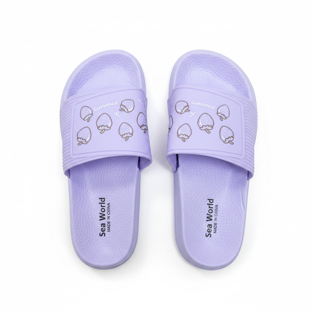 Pair of lavender purple slides featuring a cute strawberry pattern on the strap.