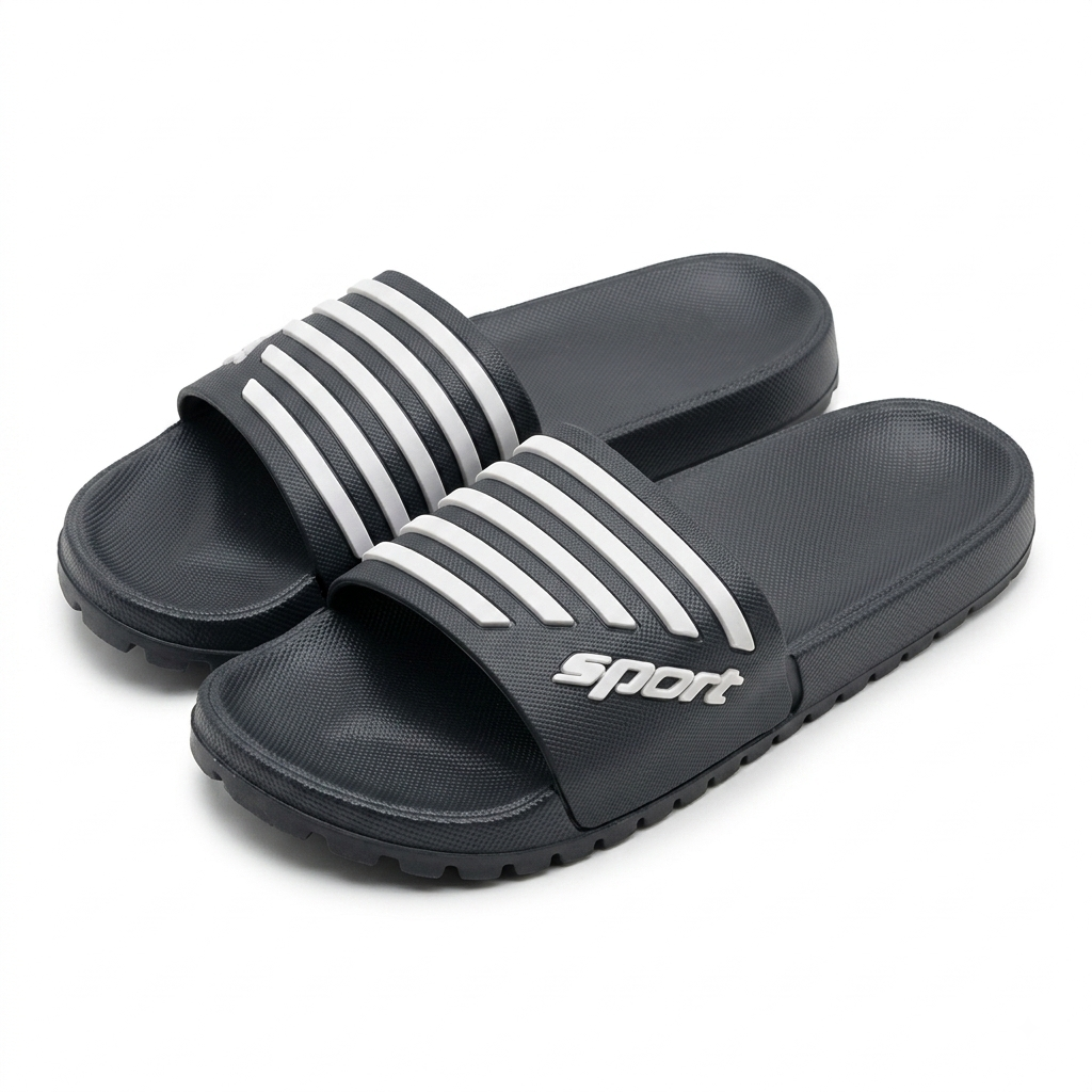 A pair of black slide sandals with white stripes and a white 'sport' logo on the strap, shown on a clean white background.