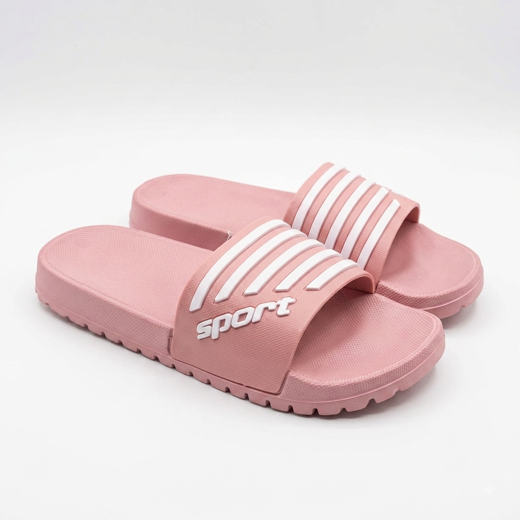 A pair of pink slide sandals with white stripes on the straps and the word 'sport' printed on the side, photographed on a clean white background.