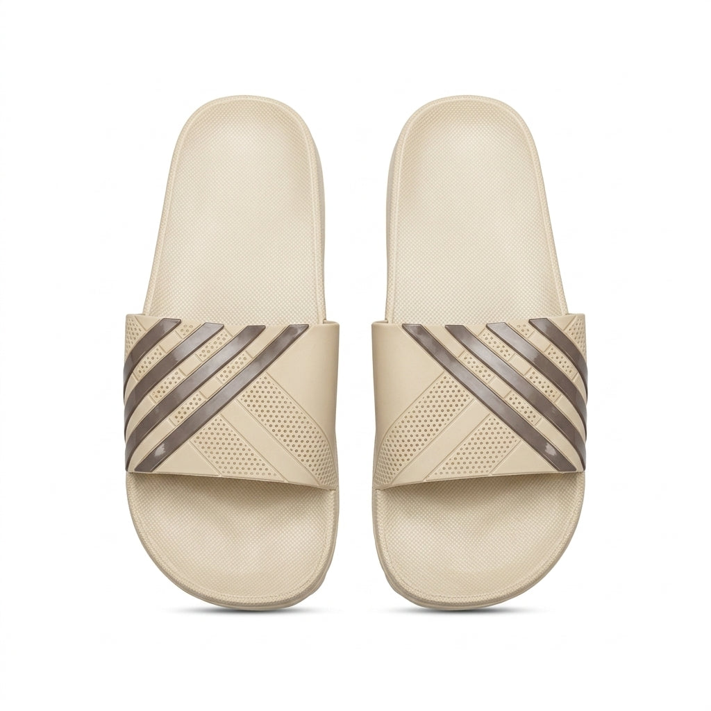 Pair of beige casual slide sandals with dark brown diagonal striped strap top view