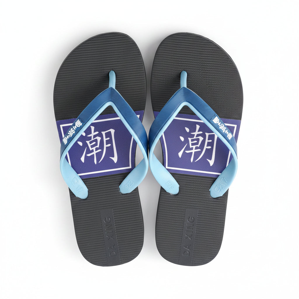 Pair of unisex casual flip flops in black and blue with graphic print design