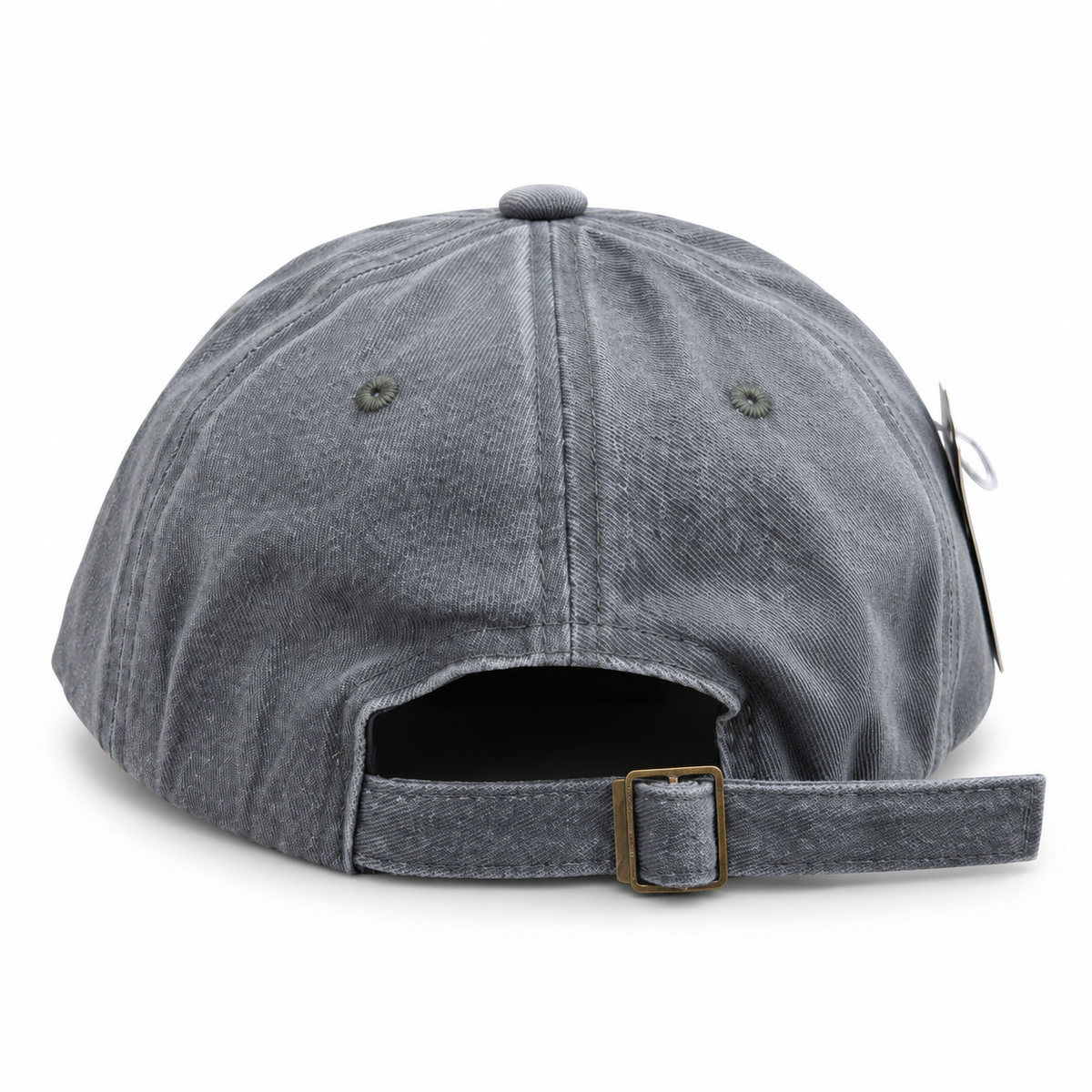 Back view of a vintage grey washed baseball cap showing the adjustable cloth strap and metal buckle.