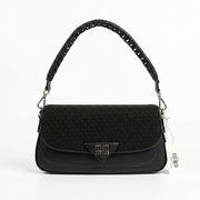 A black textured shoulder bag with a black woven strap, featuring a triangular metal logo plaque on the front flap and a white product tag attached, set against a plain white background.