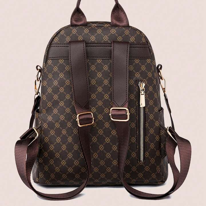 Brown patterned backpack with gold accents on a beige background