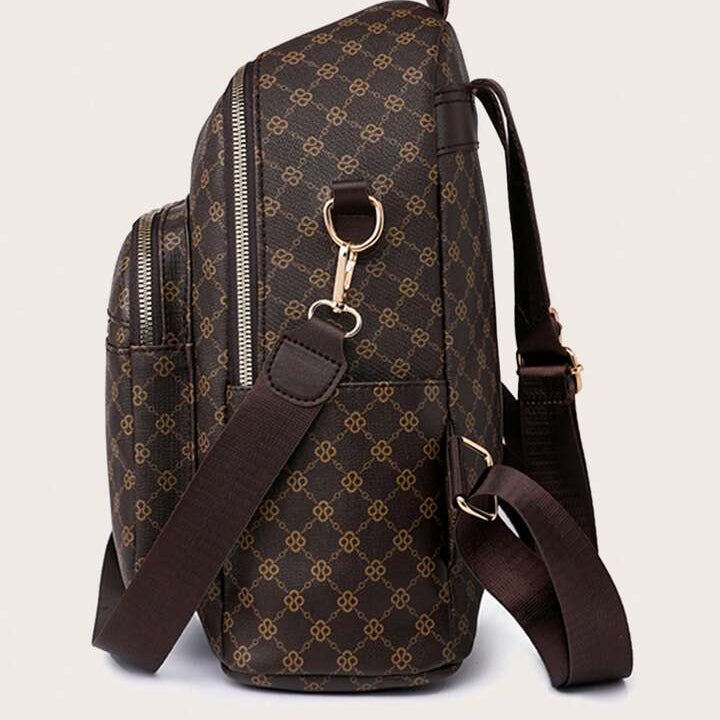 Brown patterned backpack with gold accents on a light gray background