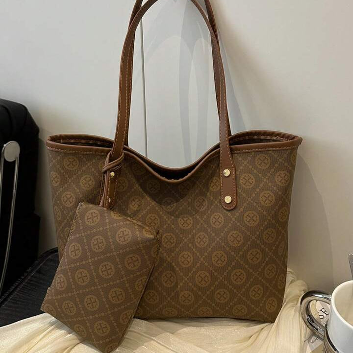 Womens brown casual tote bag with an all over geometric pattern featuring long shoulder straps and a matching detachable pouch