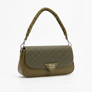 An olive green Miu Miu shoulder bag with a textured woven flap, a braided top handle, and a gold-tone triangular logo plaque on the front, set against a plain white background.