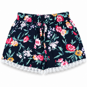 Women's navy blue multicolor floral lounge shorts with white lace trim and elastic waistband – front view