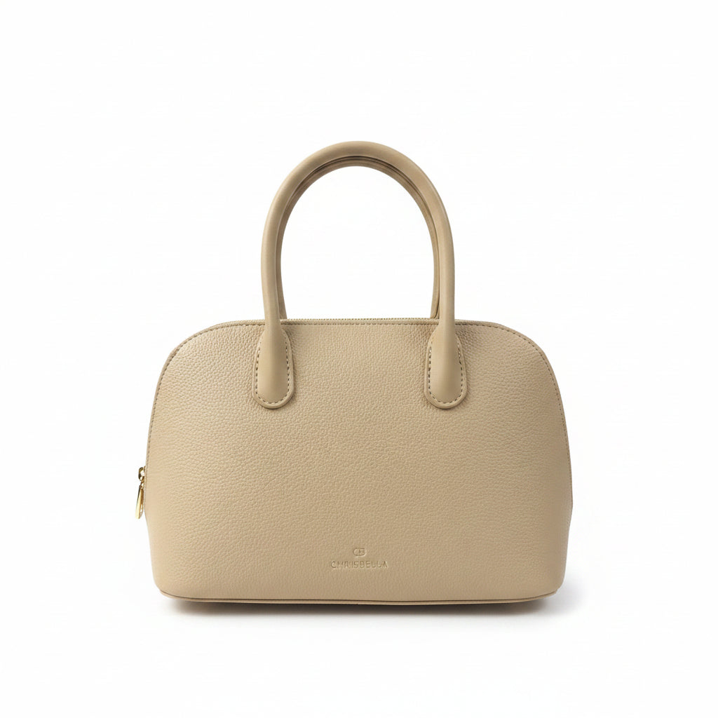 Clean back view of the textured beige handbag showing the grain material and dual handles